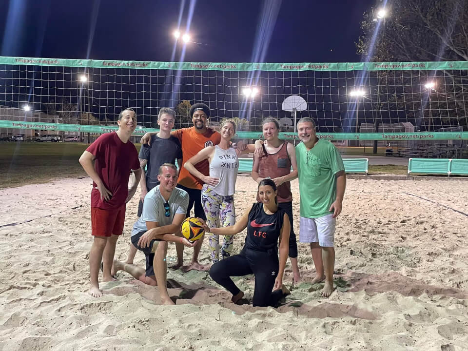 events and adventures Tampa singles playing volleyball